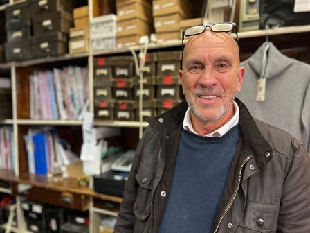 Chris Marshall stood inside his shop