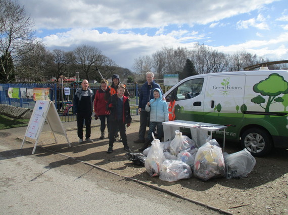 A group of people, including children, participating in litter picking in Brinsley for the Great British Spring Clean 