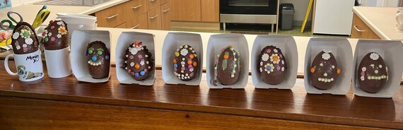 decorated chocolate eggs in a row