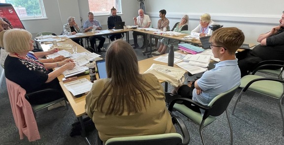 tenant complaints panel - people sitting around a table having a discussion