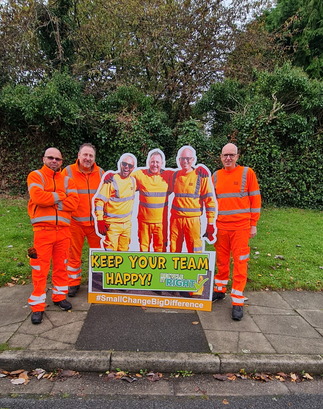 Local refuse collectors, John, Damian and Karl posing with a cardboard cut out of them