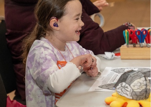 child participating in memory workshop