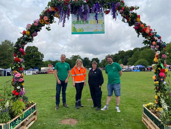 Environment team under green archway