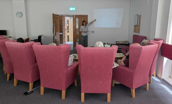 Pink chairs arranged in a circle