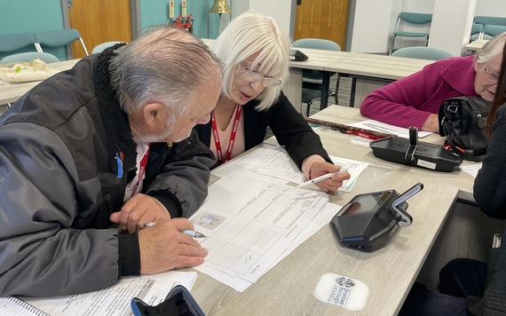 People reading papers