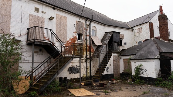 The Old Rock pub with boarded up windows