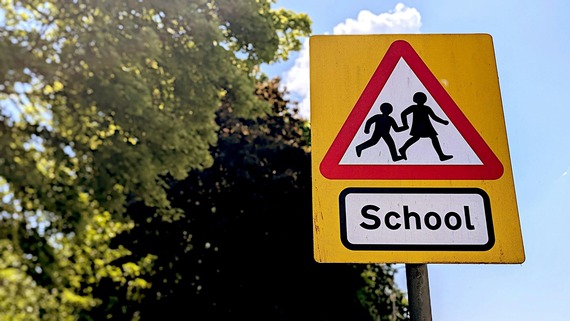 Image of a school warning road sign