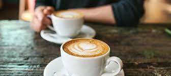 Coffee cups on table