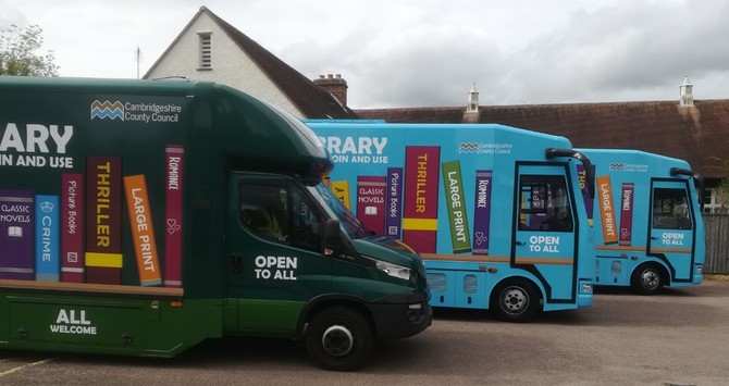 photograph of three mobile libraries