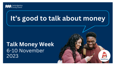 Two people looking at a phone. Text Reads, It's good to talk about Money, Talk Money Week 6-10 November 2023