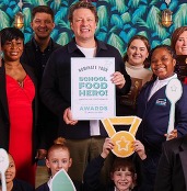 Jamie Oliver at school with children and staff