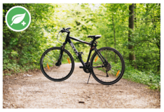A bike on a trail and Grenn Leaf logo