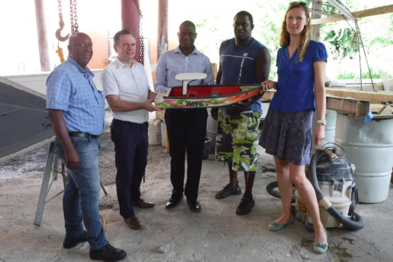 Bryony pictured in Dominica where she was gathering data on how hurricanes have affected boat builders in the area. 