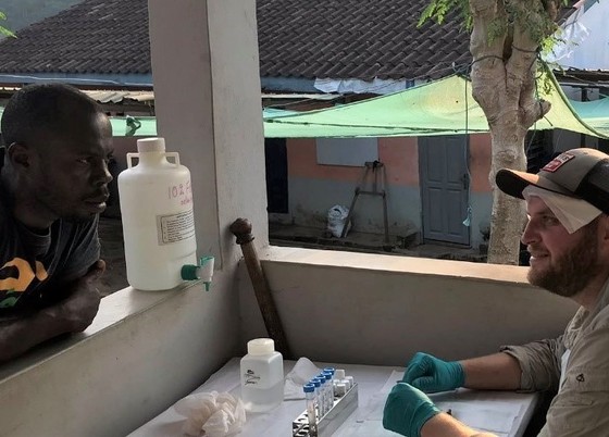 Cefas Fish Health Inspector, Josh Gray, training staff from the Ghana Fisheries Commission in fish disease diagnostics