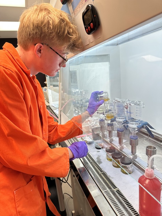 Charlie, a work experience student, working in the microplastics lab
