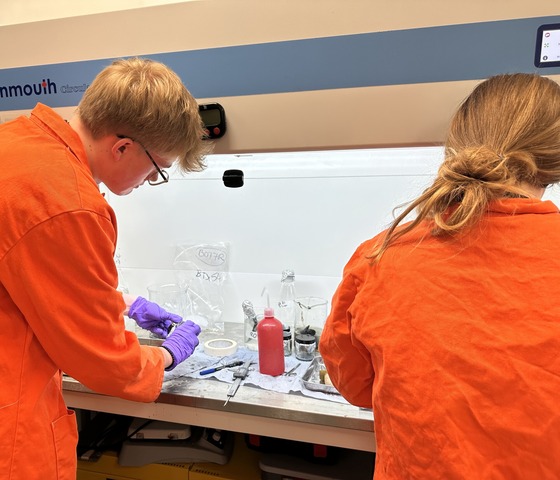 Charlie and Cefas colleague preparing mussel samples for analysis