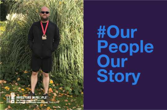 Matthew Pennell, Intelligence Service Manager at Companies House standing outside in sportswear with a medal around his neck. #OurPeopleOurStory