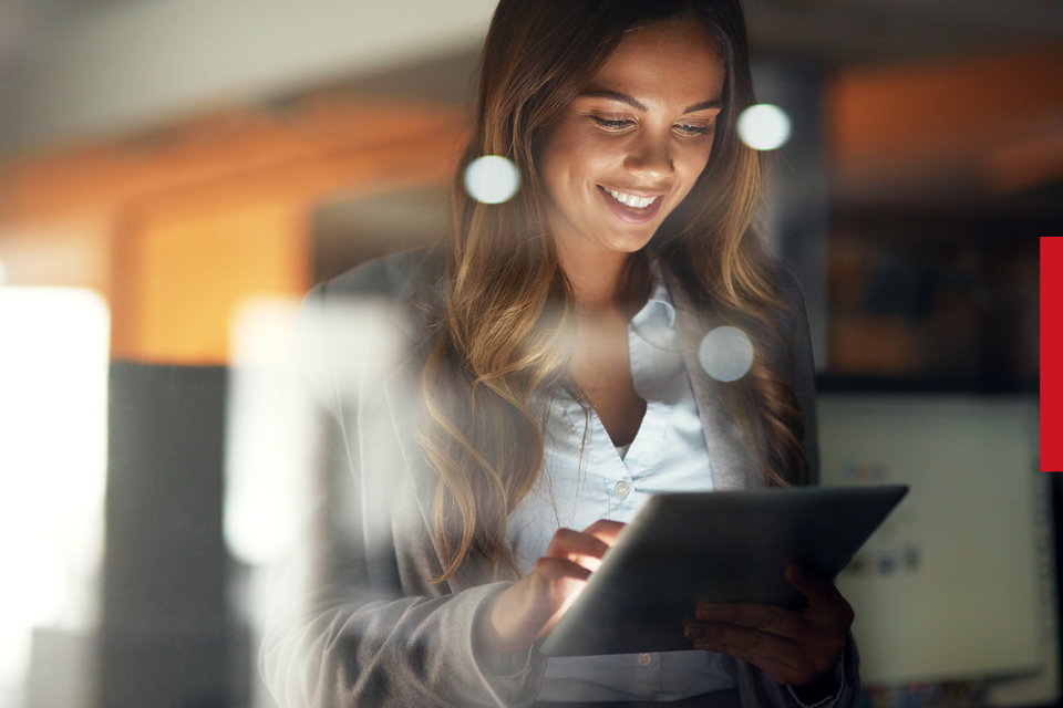 Business woman using a tablet device 