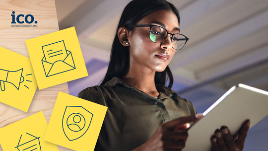 A woman wearing glasses types on a tablet device. The image features the ICO logo and post-its which icons drawn on them.