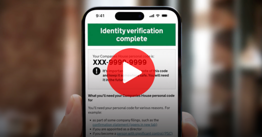 A mobile phone shows the Companies House identity verification process