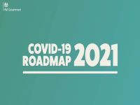 Covid-19 Roadmap 2021 underlined & HM Government logo in white writing on a blue-green background
