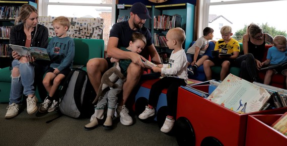 Children and parents in the library 