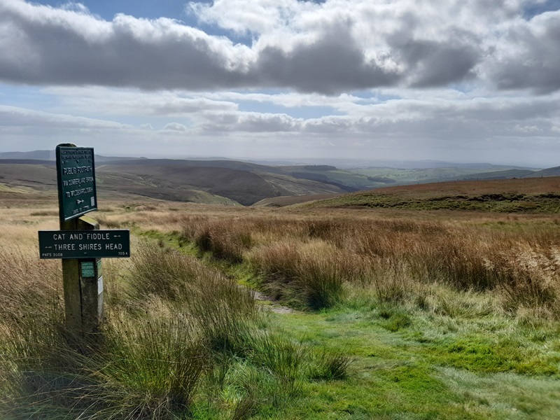 Shutlingsloe from Wildboarclough, with footpath signpost in daytime