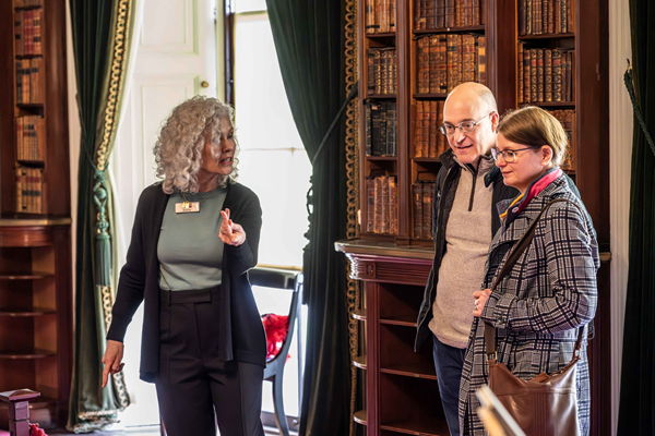 Couple on a mansion tour at Tatton Park library