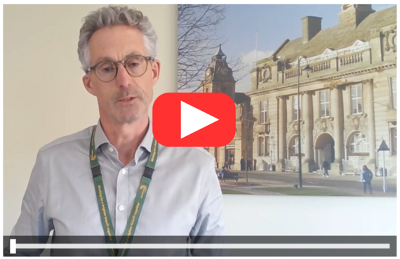 Still from Rob's video message showing him speaking to the camera