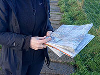 Someone looking at an ordnance survey map