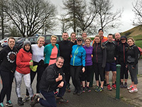 Group of runners in a car park
