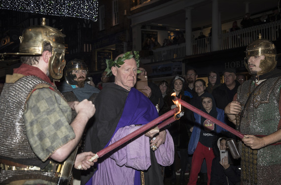 Men in Roman costume re-enact ritual as part of Chester City centre parade