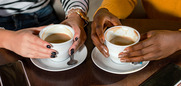 Welcoming spaces - two people having a cup of coffee