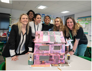 teachers and house with solar panels 