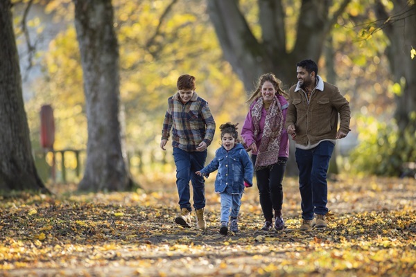 Go Walks - image of a family in a park 