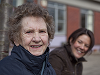 Elderly woman laughing