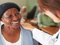 older woman and care worker