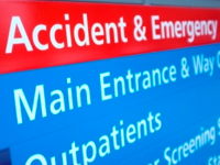 Hospital sign showing the way to accident and emergency