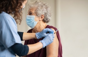 Older lady getting coronavirus vaccination 