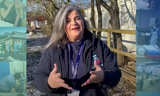 Still of care worker talking to camera