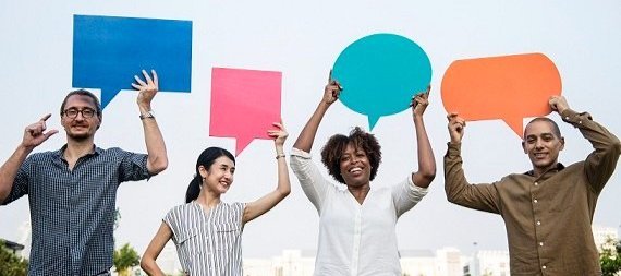 dhsc people holding speech shapes