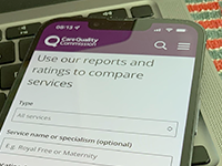 The CQC website on a mobile phone.