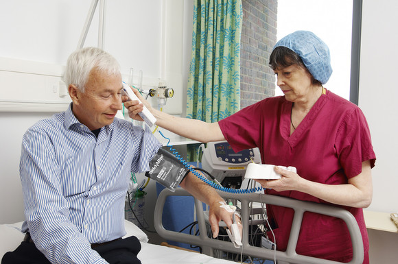 Man receiving care in hospital