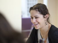 A smiling young person.