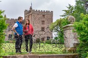 Tourists visiting Muncaster Castle