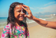 sunscreen on child