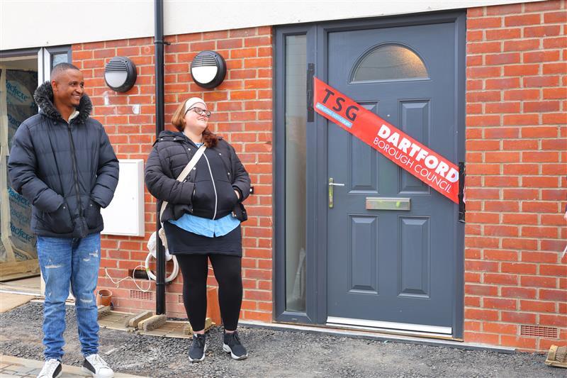 Residents outside their new home in Swanscombe