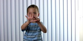 Boy counting his fingers