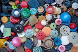 Selection of buttons of various sizes, shapes and differing number of holes