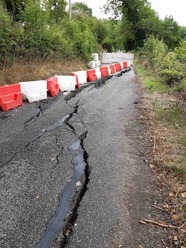 Oker Road, near Darley Bridge, with cracks to the road surface visible following the landslip.